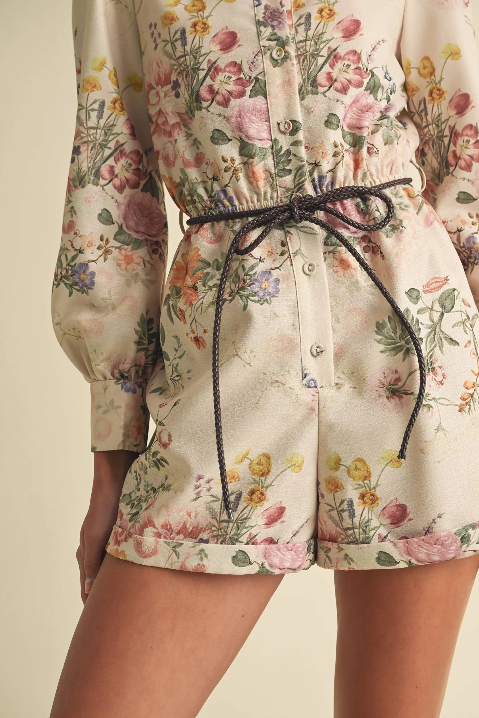 Faux leather belted Floral Playsuit.