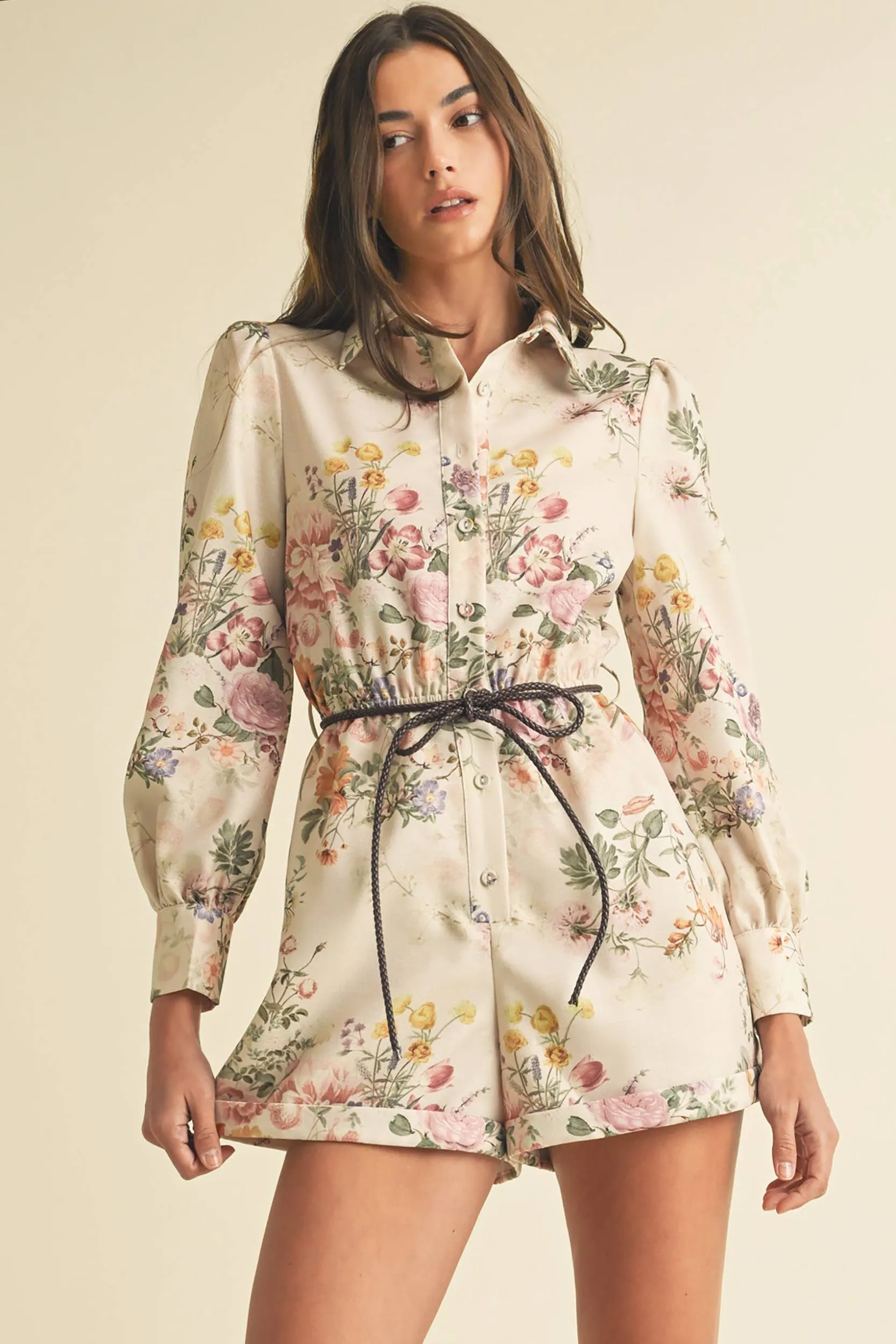 Faux leather belted Floral Playsuit.