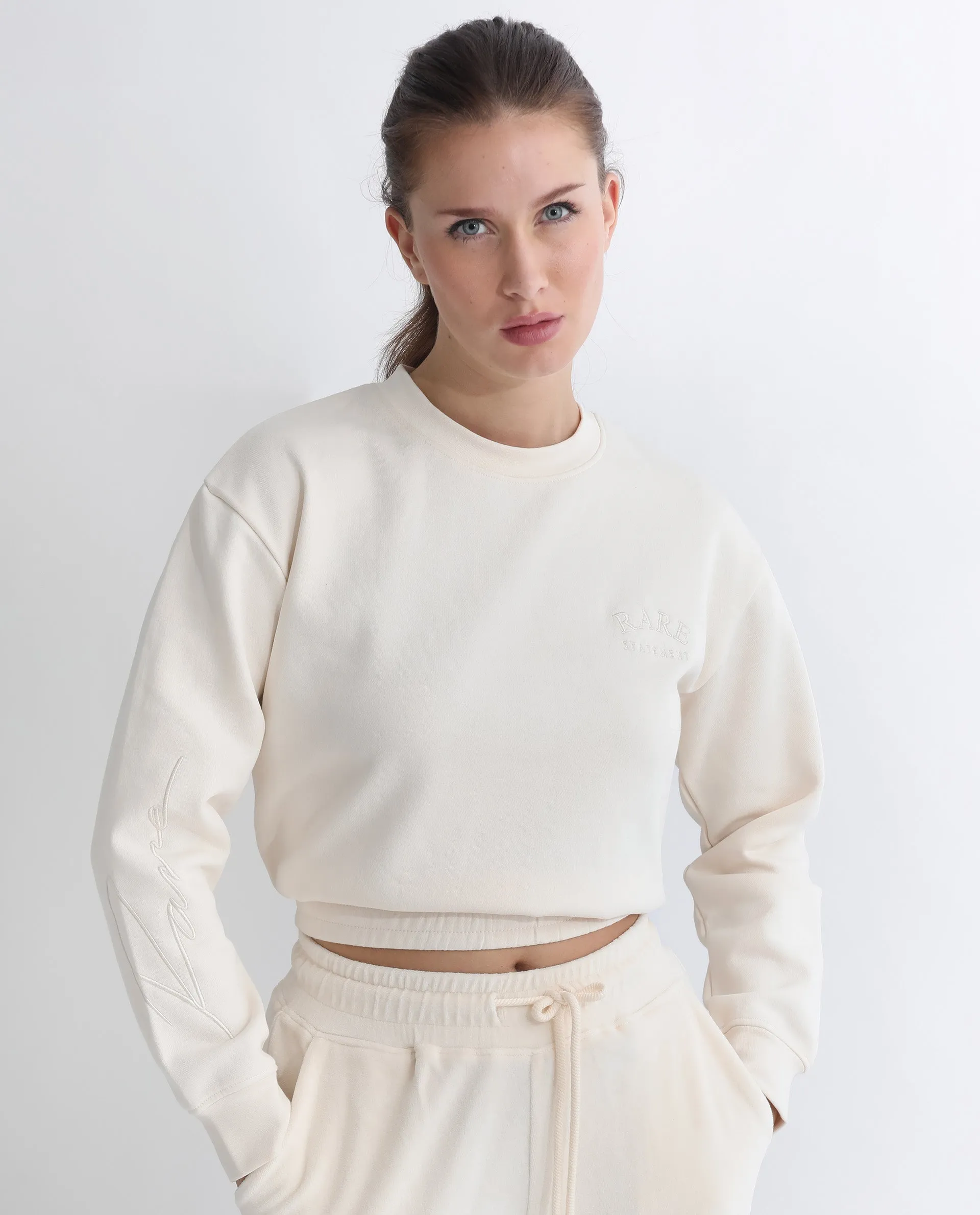 Rareism Articale Women Krok Beige Poly Cotton Fabric Full Sleeves Cuffed Sleeve Round Neck Regular Fit Plain Cropped Sweatshirt