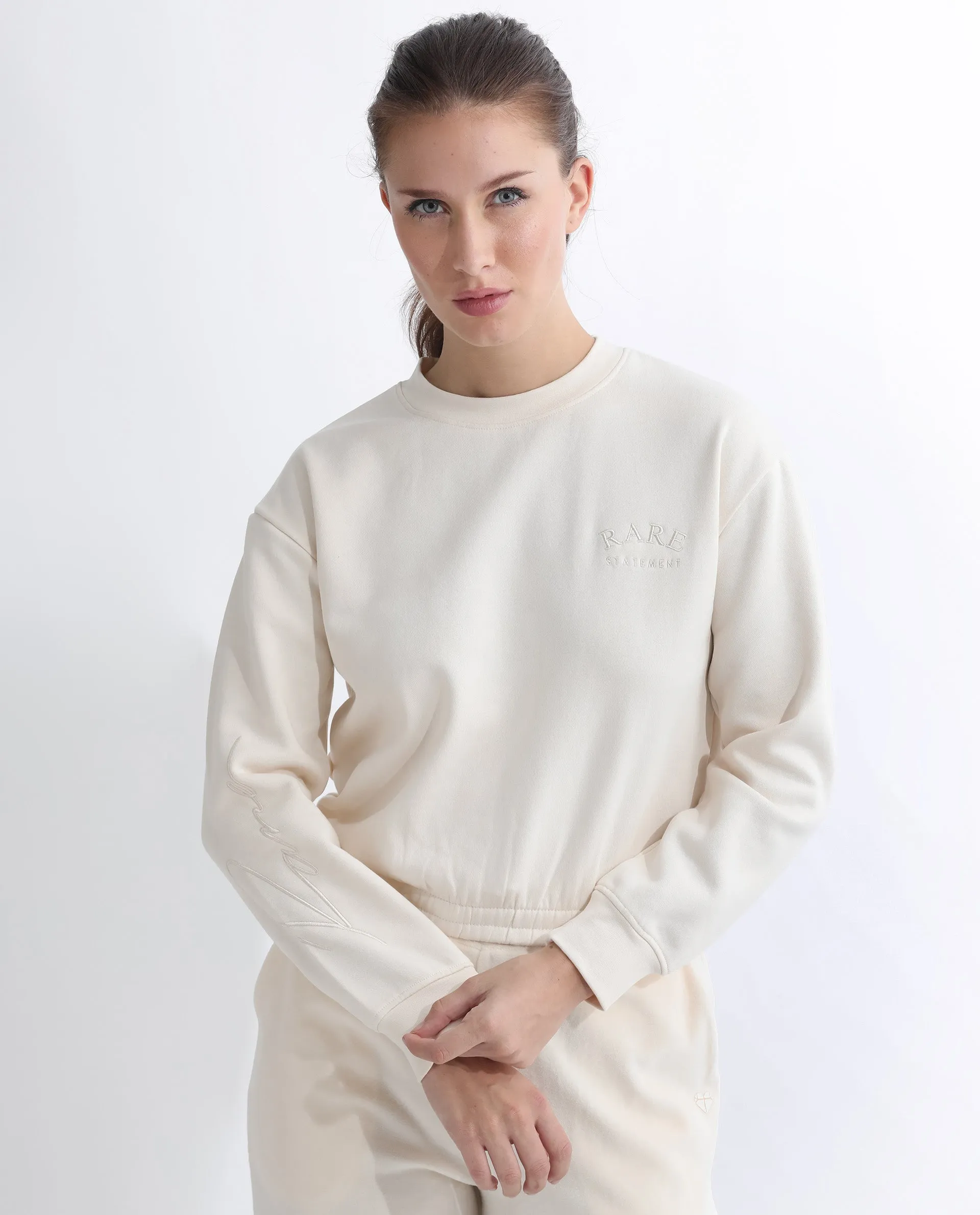 Rareism Articale Women Krok Beige Poly Cotton Fabric Full Sleeves Cuffed Sleeve Round Neck Regular Fit Plain Cropped Sweatshirt