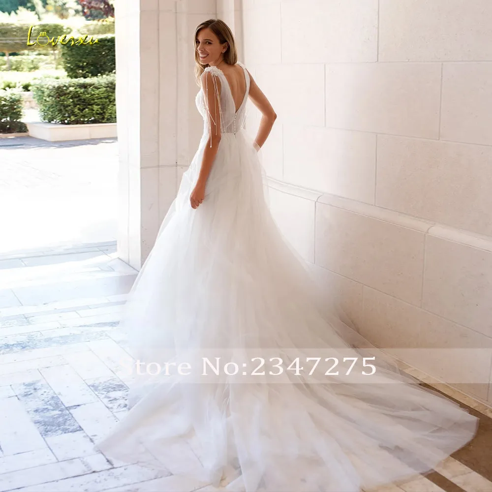 V-Neck Sleeveless Tassel Robe Beaded Appliques A-Line Wedding Dress